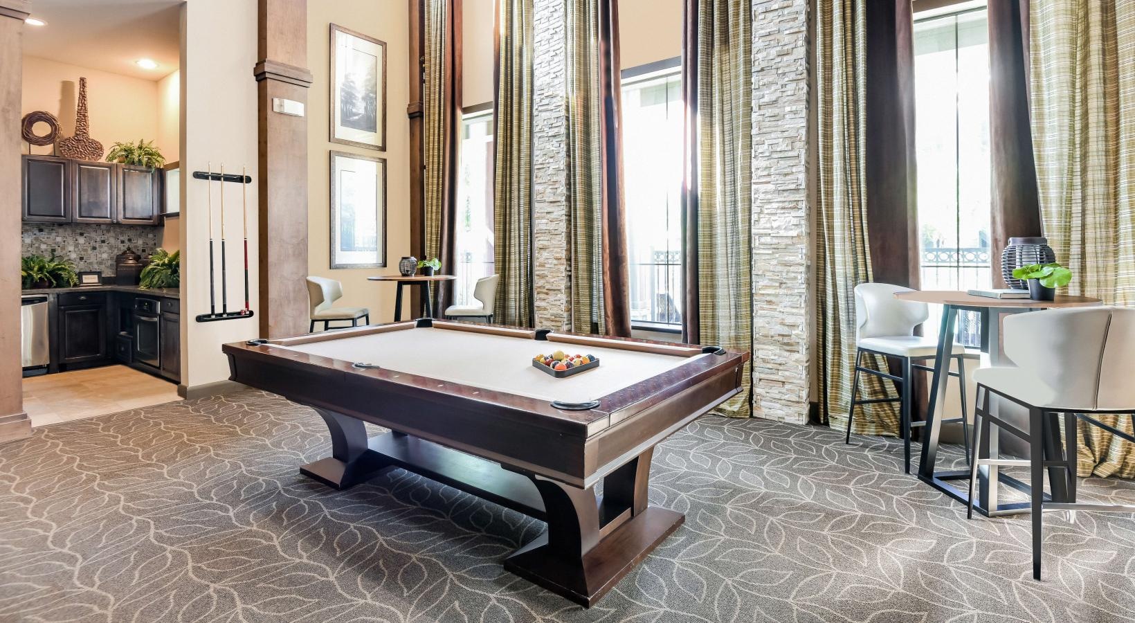 Everything within reach game room with billiards table