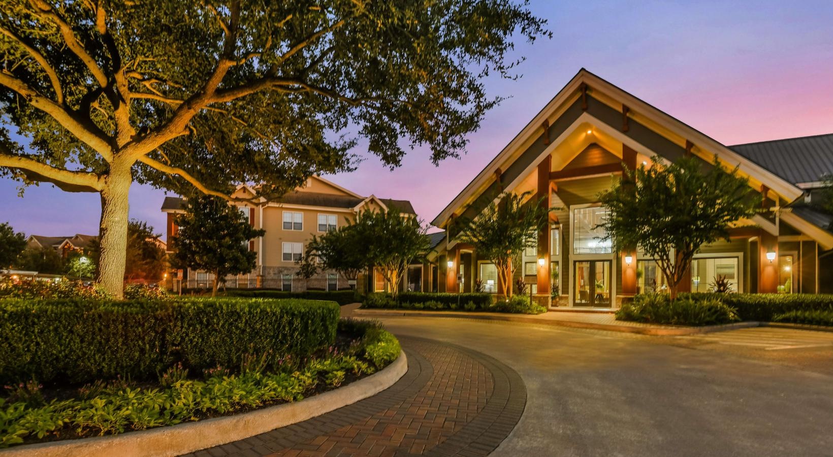 The essence of exceptional living circular driveway to leasing center