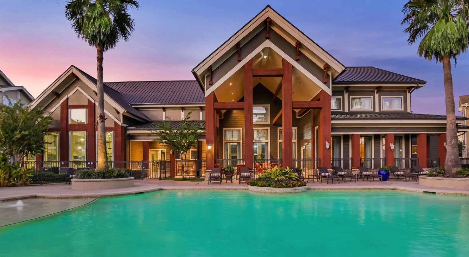 Relax and unwind poolside large pool in front of clubhouse