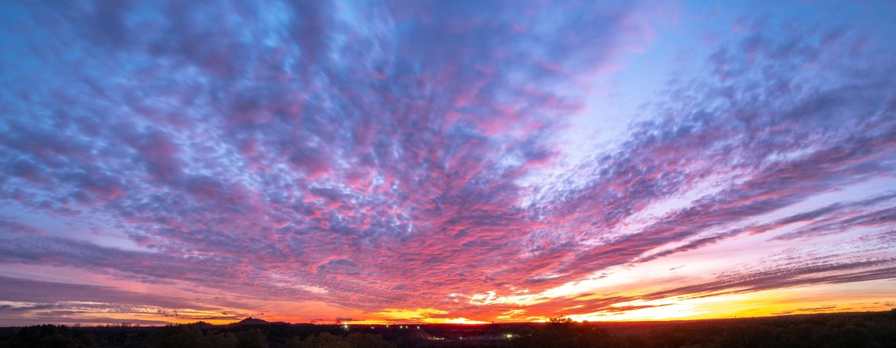 a colorful sky with clouds
