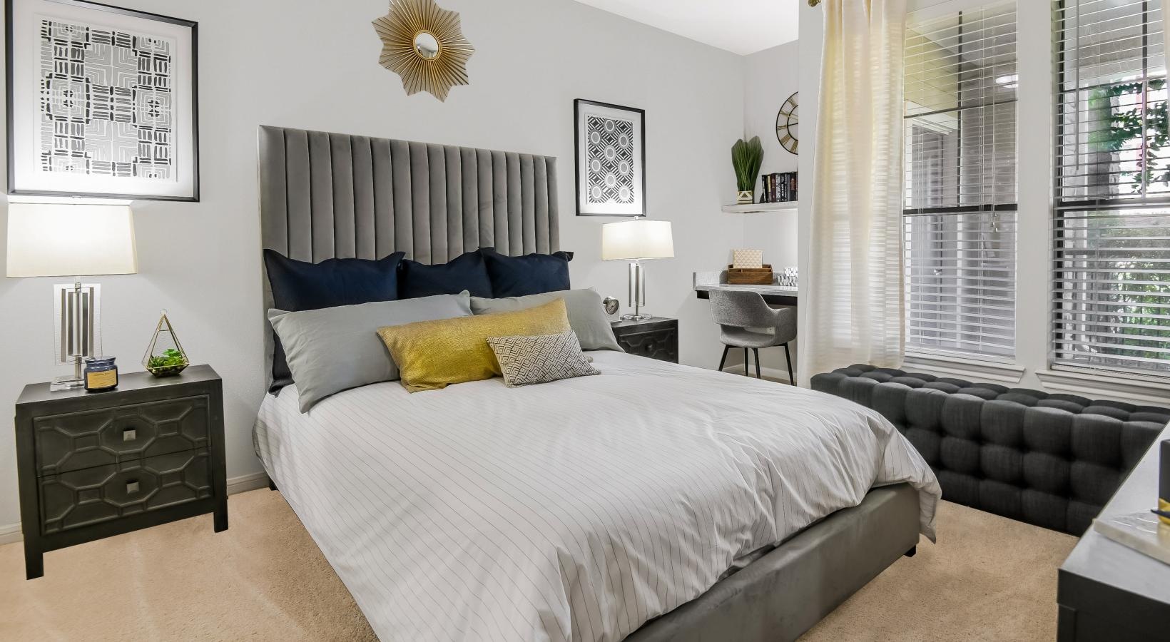 Generous bedroom offerings to fit every family a bedroom with a bed and a window