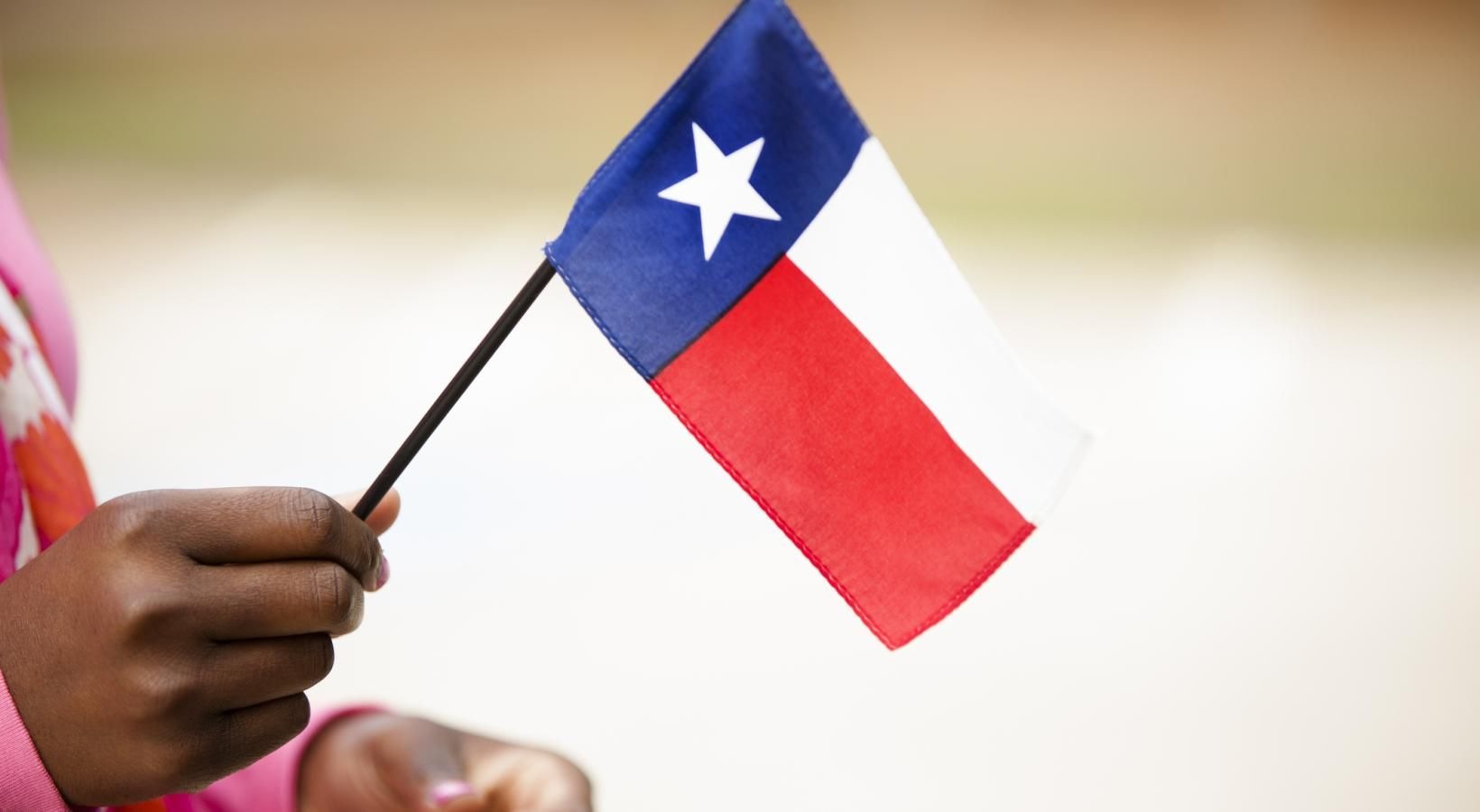 A beautiful community at the heart of all your passions a person holding a flag