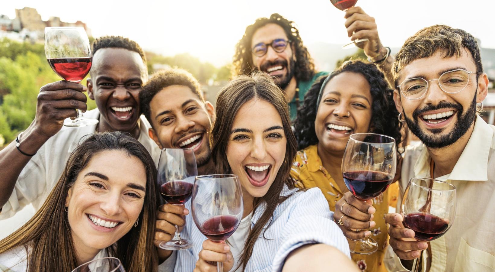 A beautiful community at the heart of all your passions a group of people holding wine glasses