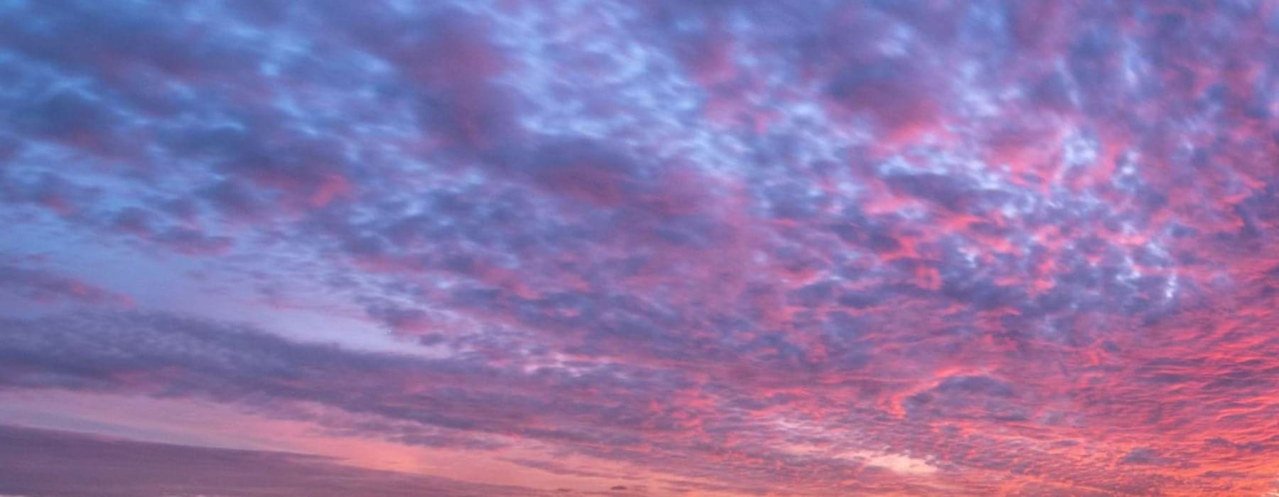 a colorful sky with clouds