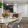a dining room with a table and chairs