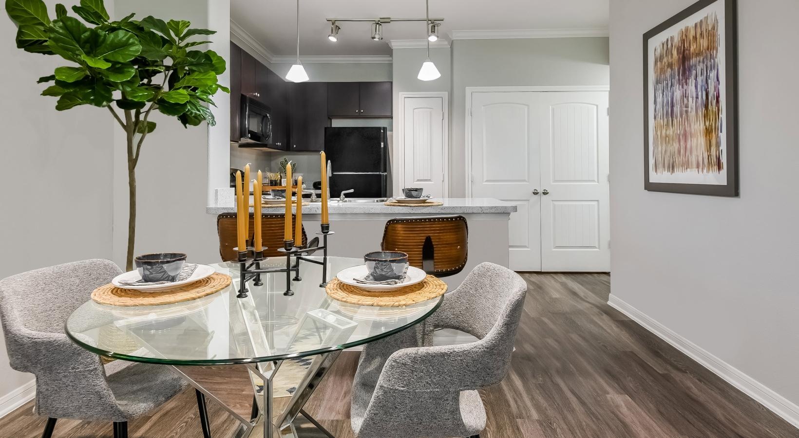 Generous living spaces to relax and unwind a dining room with a table and chairs